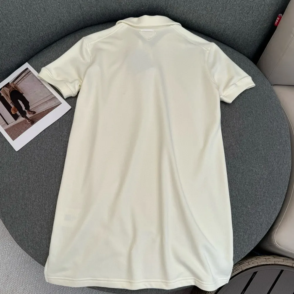 Side angle showing flared silhouette of Prada Women Short Fleece Natural Dress