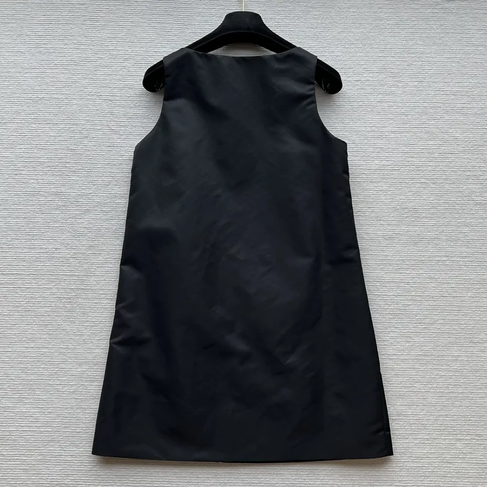 Side profile showing silhouette of Prada Women Sleeveless Re-Nylon Dress