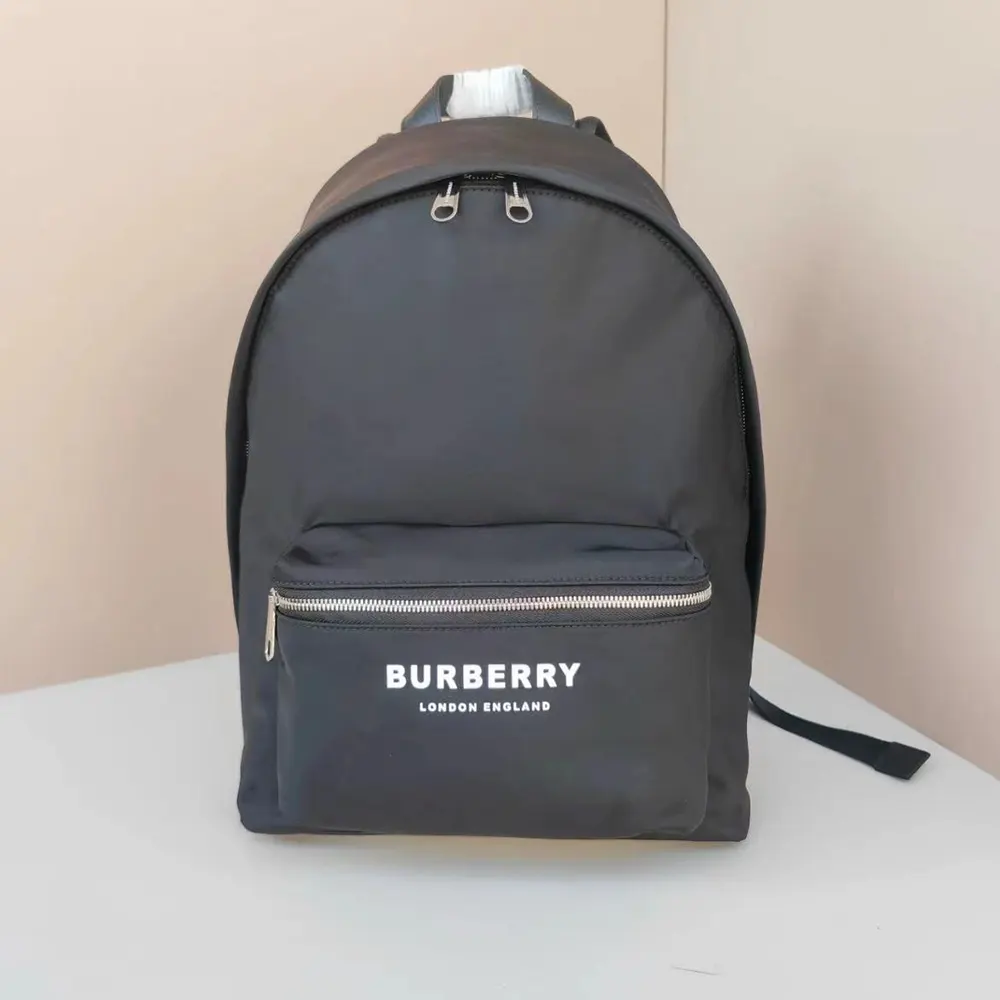 Close-up of matte black hardware on Burberry Men Logo Print ECONYL Backpack-Black