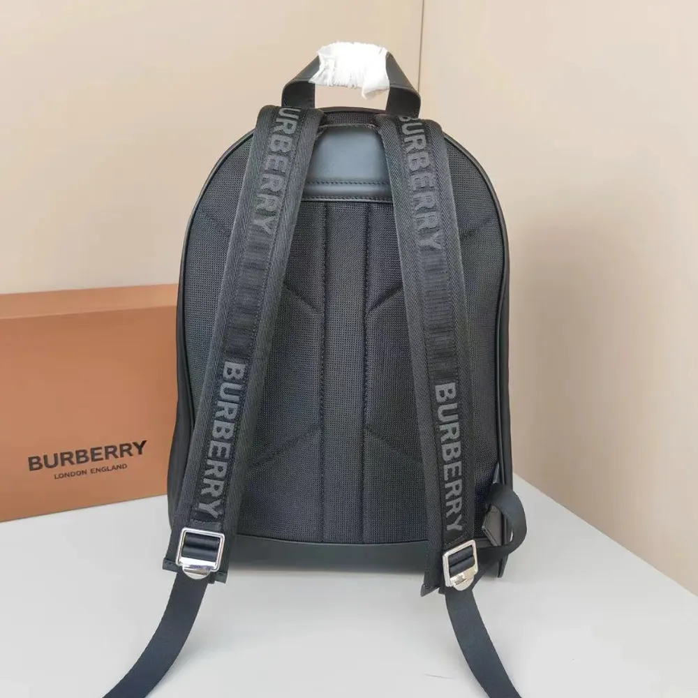 Side angle showing adjustable straps on Burberry Men Logo Print ECONYL Backpack-Black