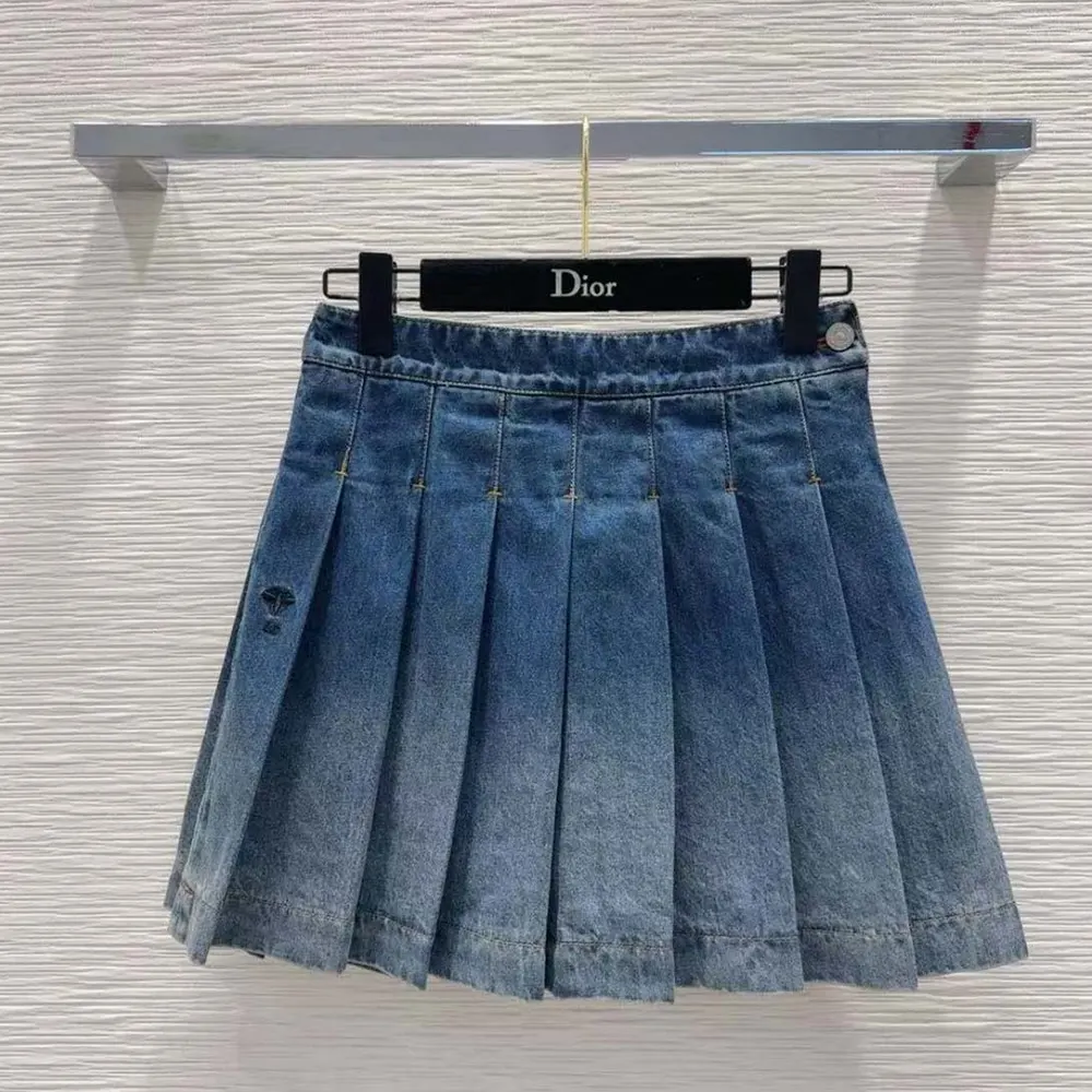 Front view of Dior Women Wrap Miniskirt with Integrated Shorts in navy denim
