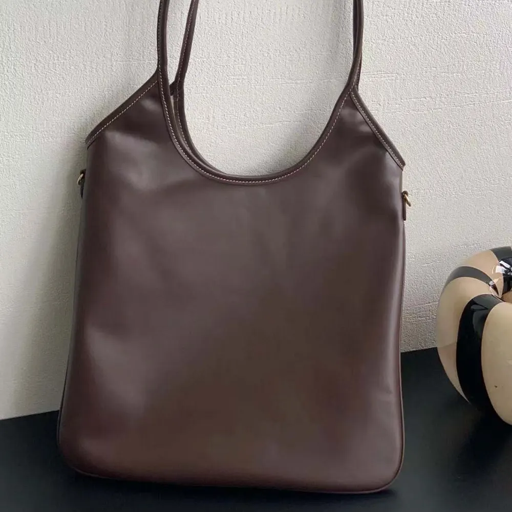Side view highlighting silhouette and smooth leather texture of Miu Miu Women IVY Leather Bag-Chocolate