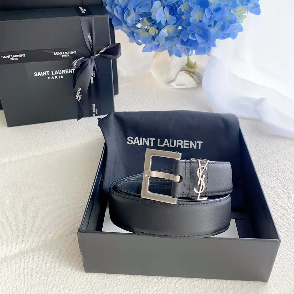 Close-up of smooth leather and polished buckle on Saint Laurent YSL belt