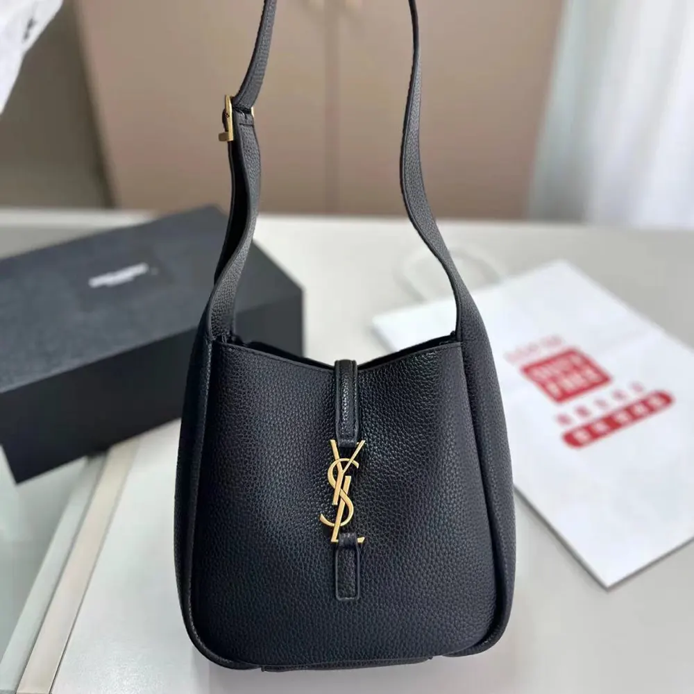Side angle showing supple texture of Saint Laurent YSL Women Le 5 à 7 Supple Baby