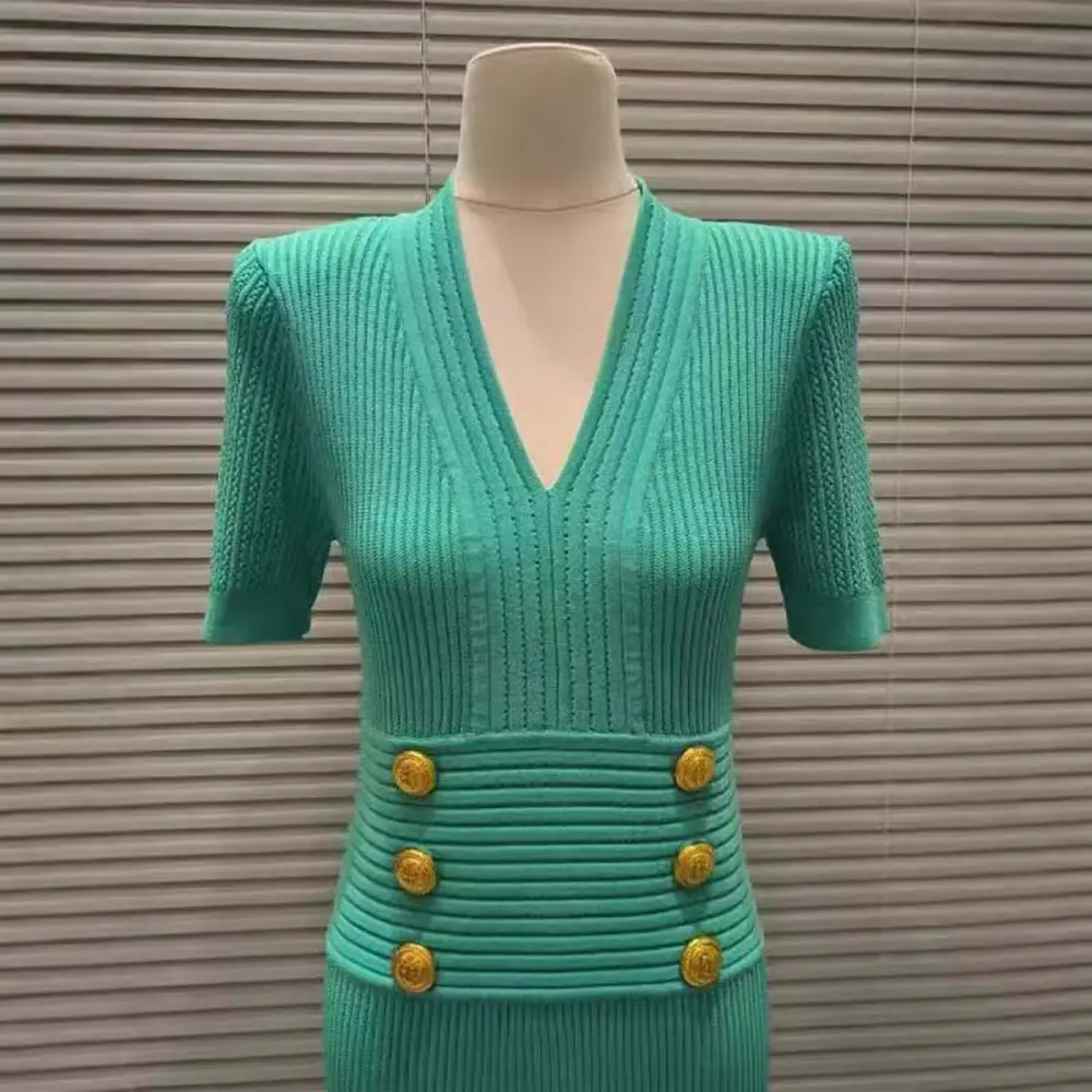 Side angle showing flare silhouette of Balmain Women Flared Knit Dress-Light Blue