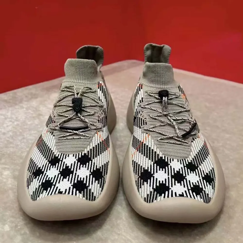 Close-up of Burberry check detail on Neptune Sneakers-Sandy lateral side