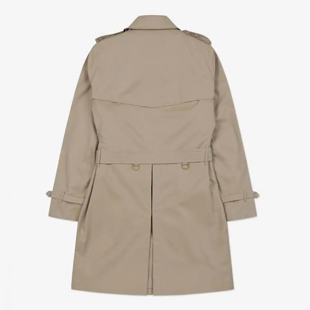 Close-up of antique gold buttons on Burberry Women Chelsea Heritage Trench Coat