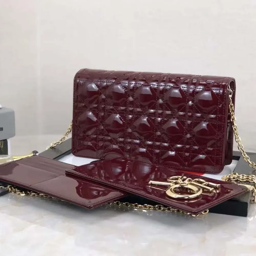 Close-up of silver hardware and zipper on Dior Lady Dior Pouch Patent Cannage Calfskin-Maroon