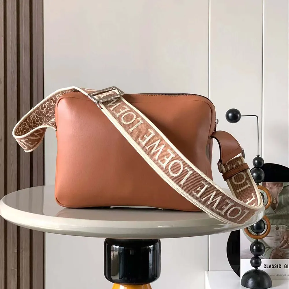 Side view showing adjustable strap of Loewe Men XS Military Messenger Bag