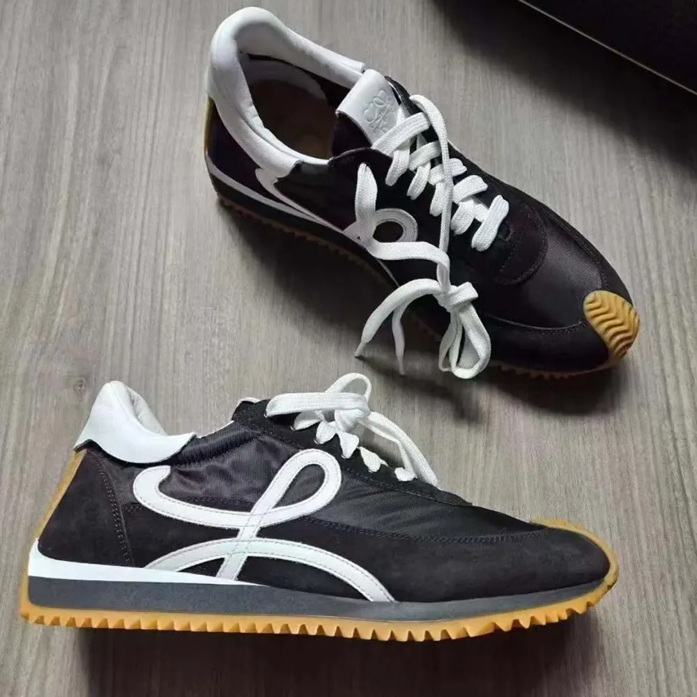 Top view showing black nylon and suede textures of Loewe Flow Runner