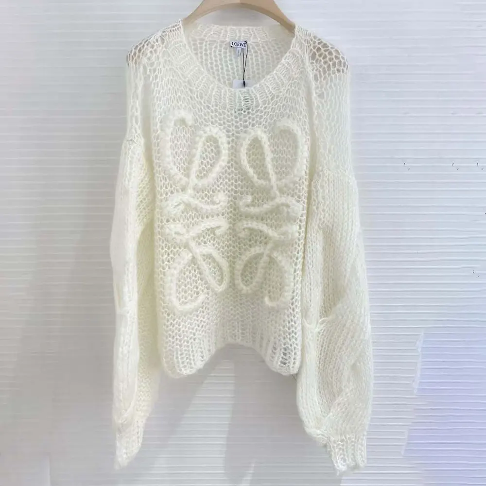 Side angle of Loewe Women Anagram Sweater highlighting relaxed fit and texture