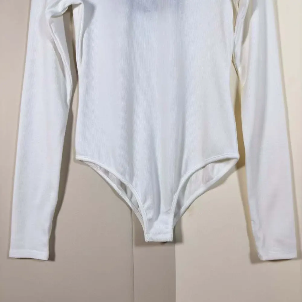 Side angle showing slim fit of Prada Women Ribbed Knit Jersey Bodysuit-White