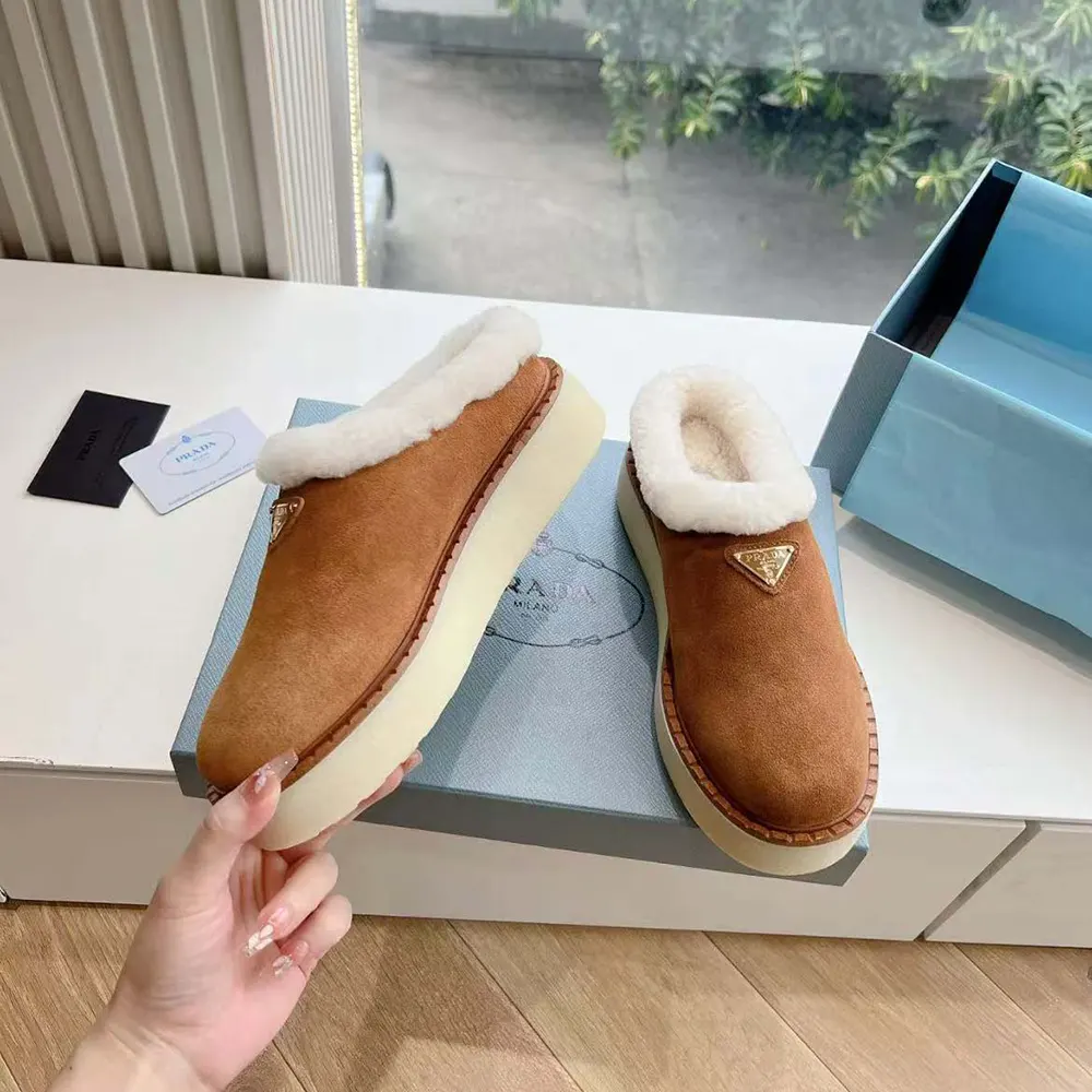 Top-down angle showing plush suede texture on Prada Women Suede Mules