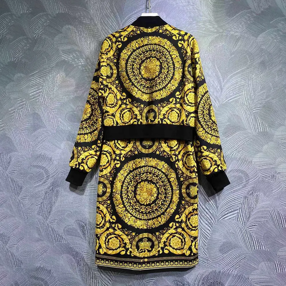 Side angle highlighting elastic waistband and silk texture of Versace Women Barocco Bomber Skirt-Yellow