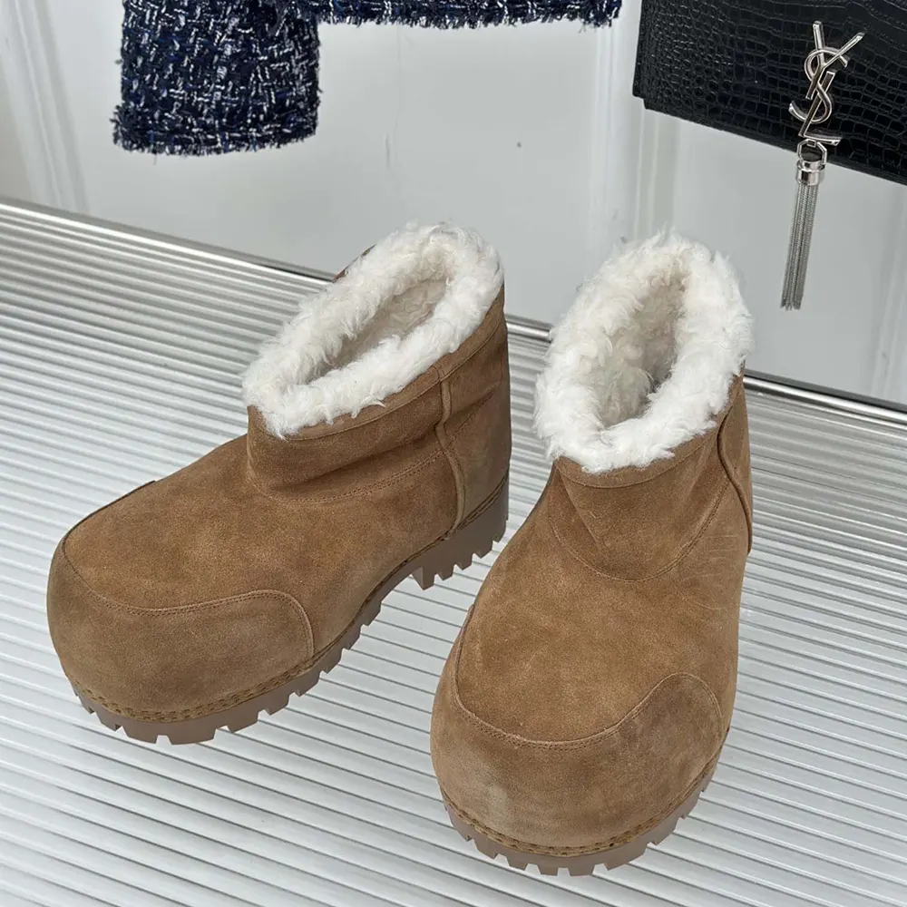 Overhead shot highlighting chunky sole and unique silhouette of Balenciaga Unisex Alaska Fur Bootie