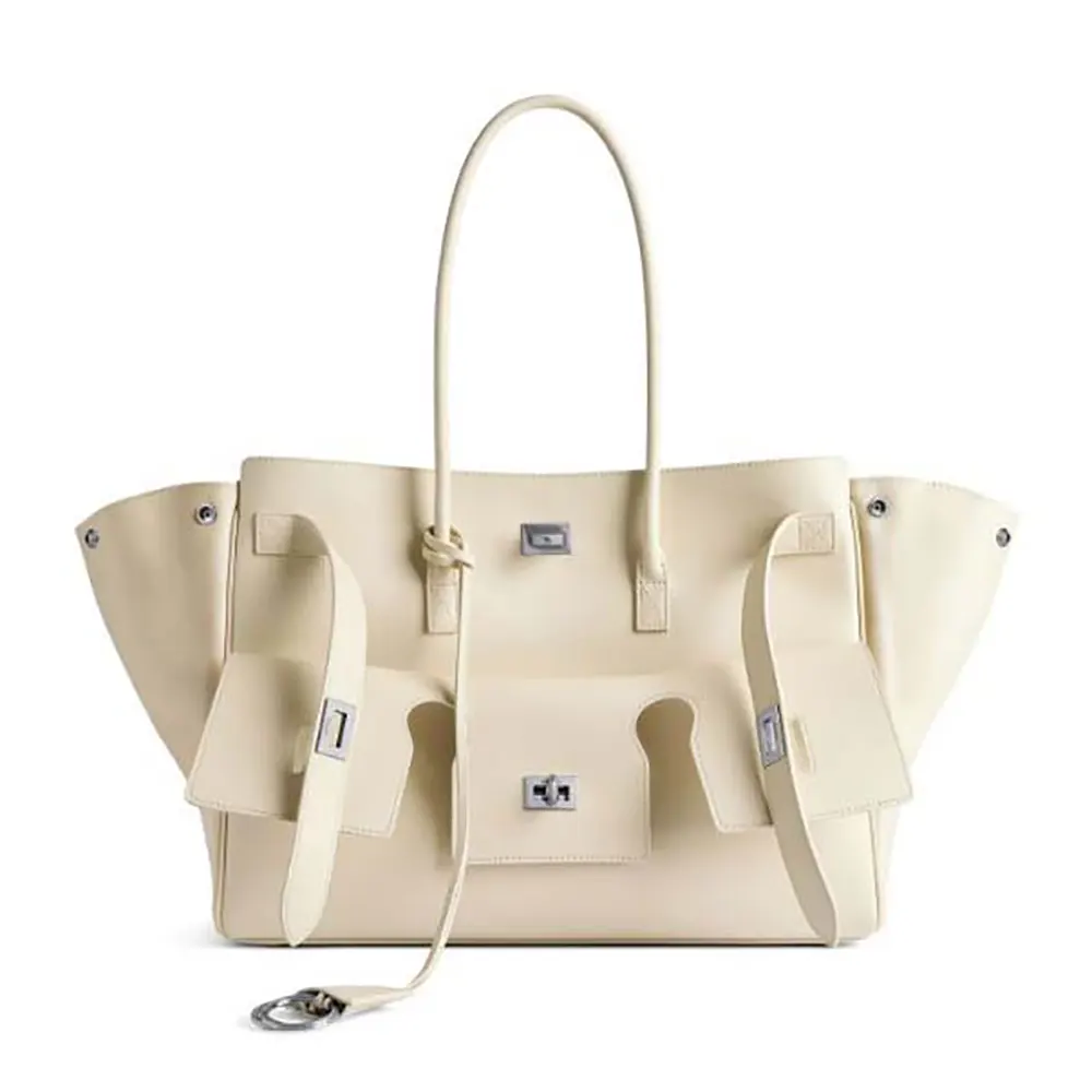 Front view of Balenciaga Women Bel Air Medium Carry All Bag beige leather