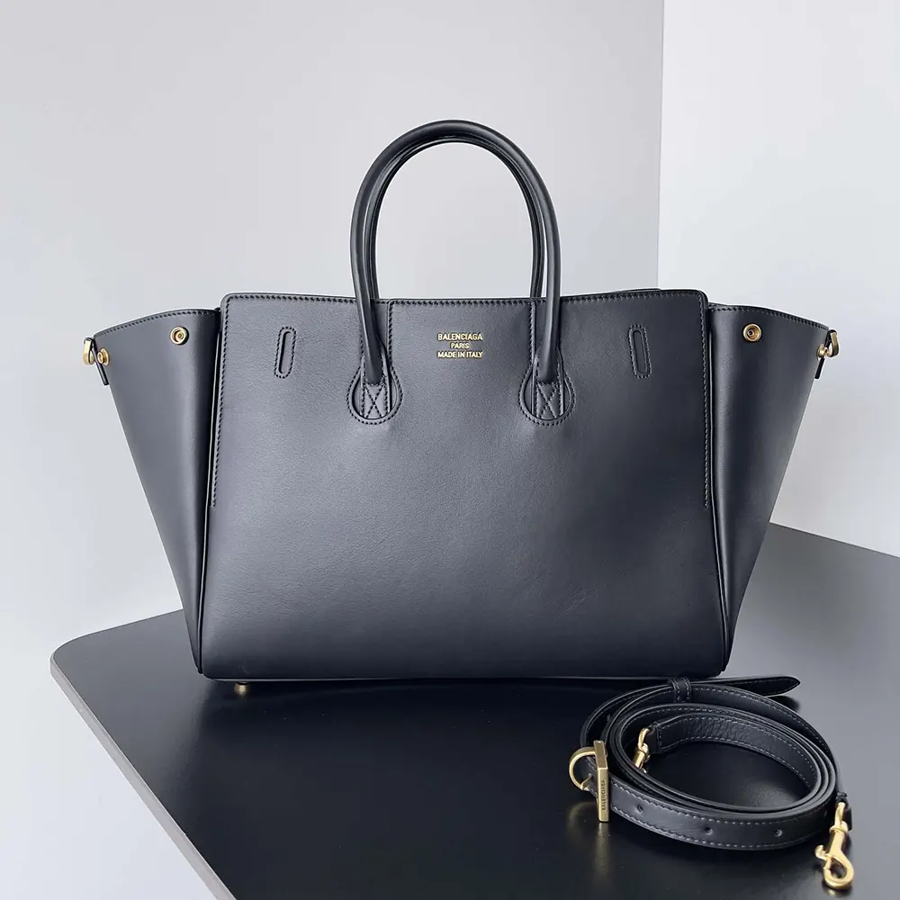 Side angle showing silhouette and strap of Balenciaga Women Bel Air bag