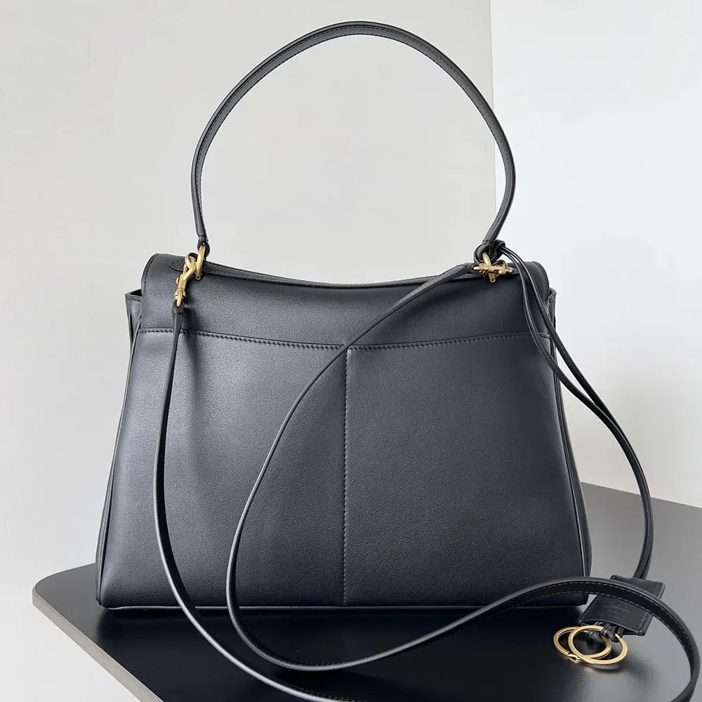 Side angle showcasing silhouette of Balenciaga Women Rodeo Medium Handbag in Black