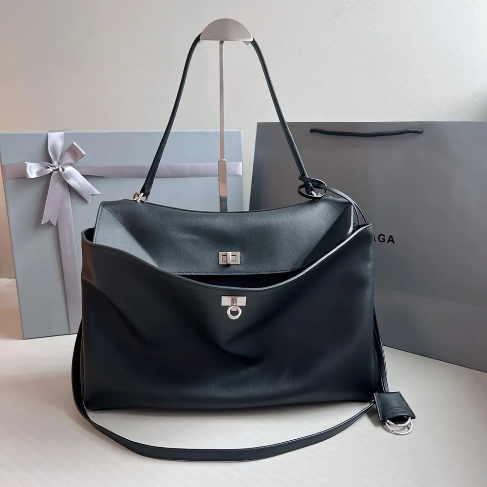Side profile showing structured silhouette of Balenciaga Women Rodeo Medium Handbag