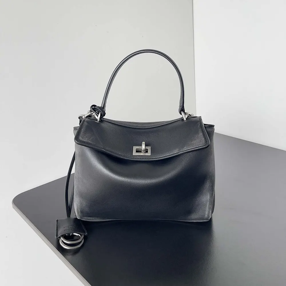 Close-up of black leather and silver studs on Balenciaga Women Rodeo Mini Handbag