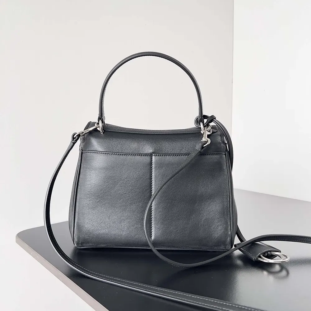 Balenciaga Women Rodeo Mini Handbag in Black displayed with adjustable shoulder strap