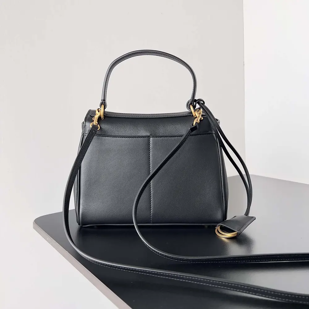 Side profile showing silhouette of Balenciaga Women Rodeo Mini Handbag in Black