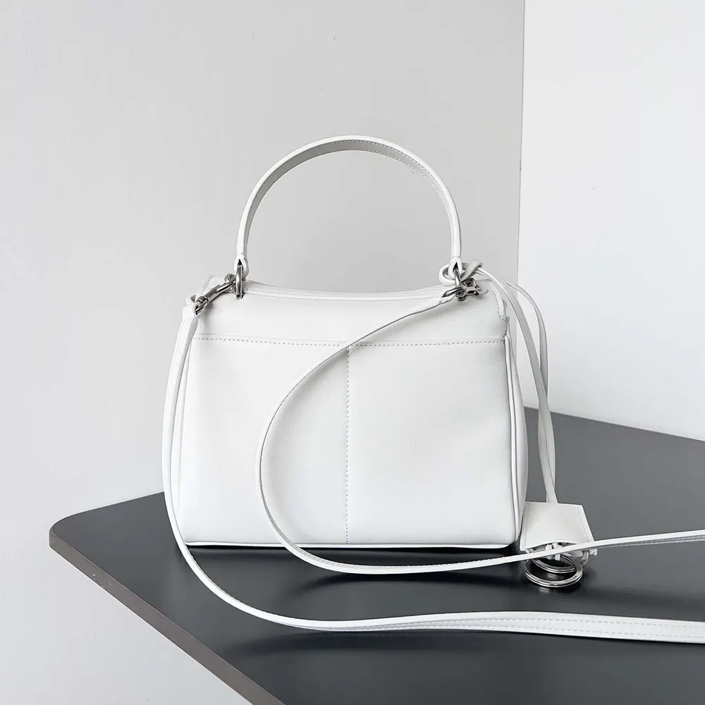 Side profile showing compact silhouette of Balenciaga Women Rodeo Mini Handbag