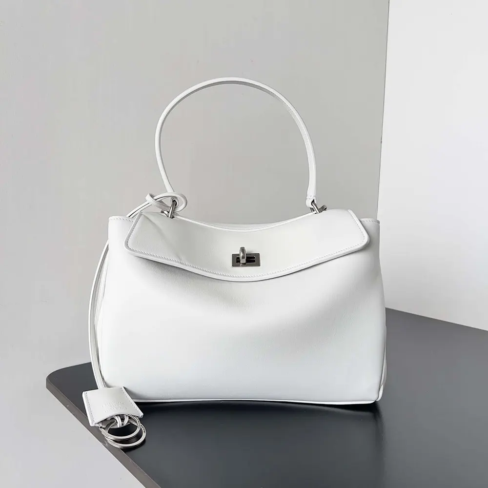 Close-up of silver hardware and signature studs on Balenciaga Rodeo bag