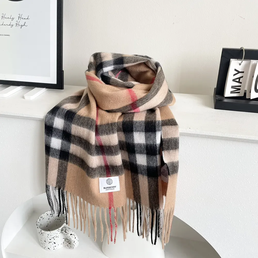 Close-up of the Burberry Unisex Check Cashmere Scarf-Beige woven cashmere texture