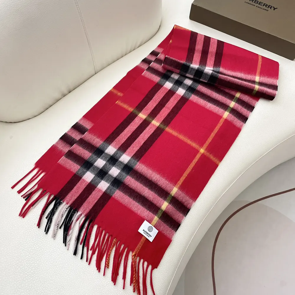 Model wearing Burberry Unisex Check Cashmere Scarf-Red styled casually
