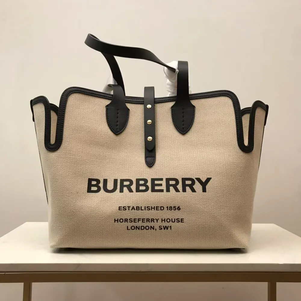 Front angle of Burberry Women The Medium Soft Cotton Canvas Belt Bag-Beige
