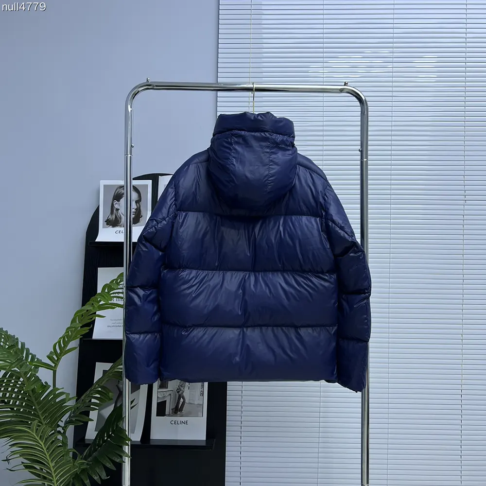 Side angle showing slim fit of Canada Goose Women Cypress Puffer Navy