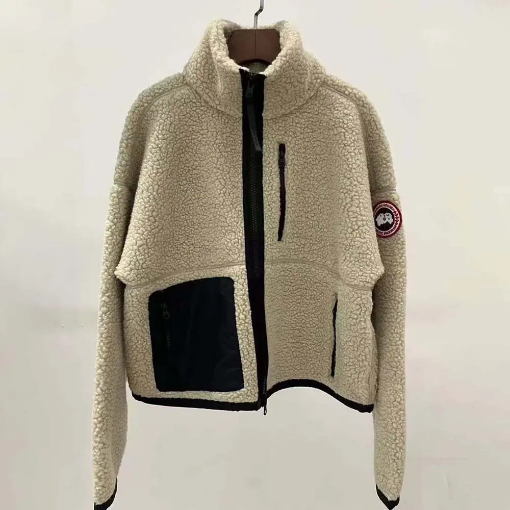 Close-up of beige fleece texture and snap-button closure on Simcoe Jacket