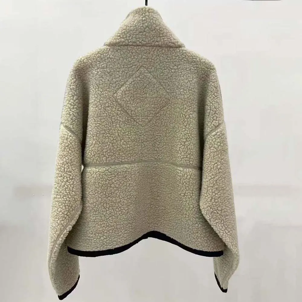 Side angle showing tailored fit of Canada Goose Women Beige Simcoe Fleece Jacket