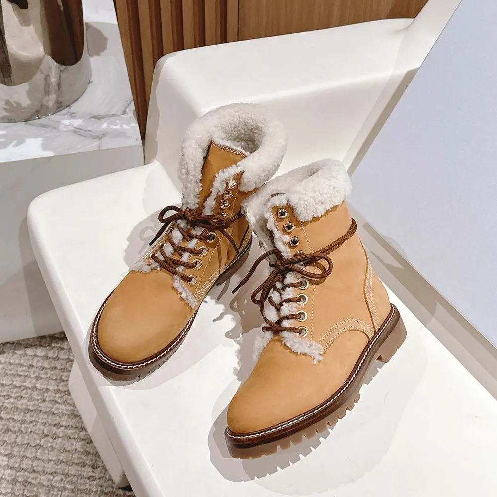 Top-down view showing signature Celine embossed logo on boot tongue