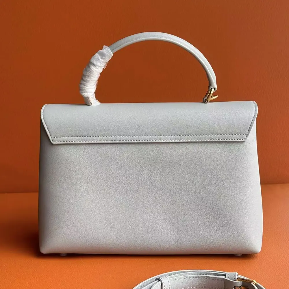 Side profile showing silhouette of Celine Women Medium Nino Bag