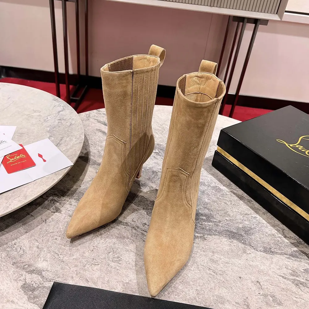 Sole view showing iconic red outsole of Christian Louboutin Women Santigag Boots