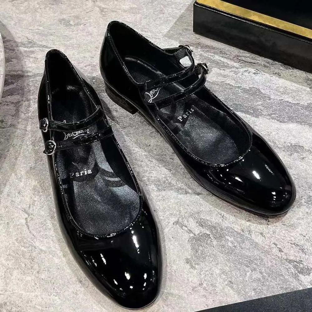 Close-up on red sole and patent finish of Sweet Jane Ballerinas