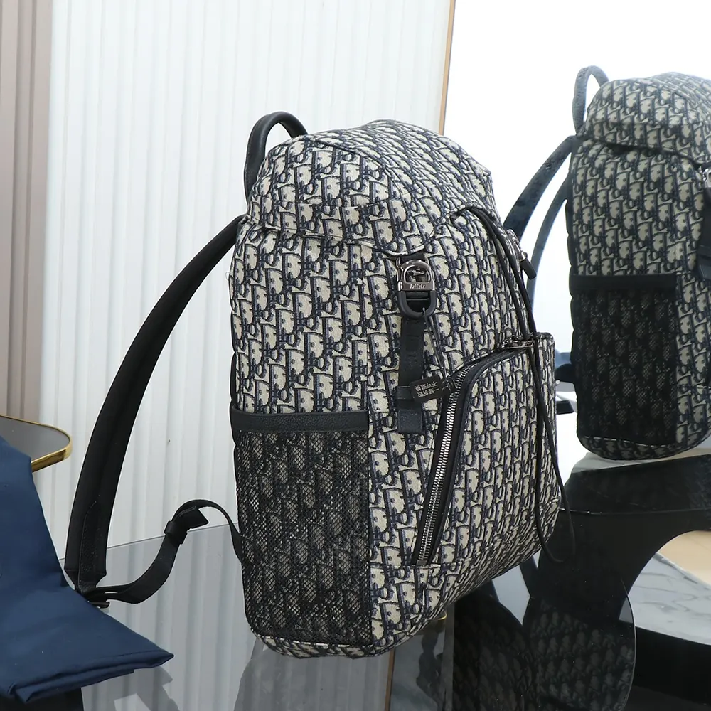 Side angle showing structured silhouette of Dior Men Dior 8 Backpack with flap