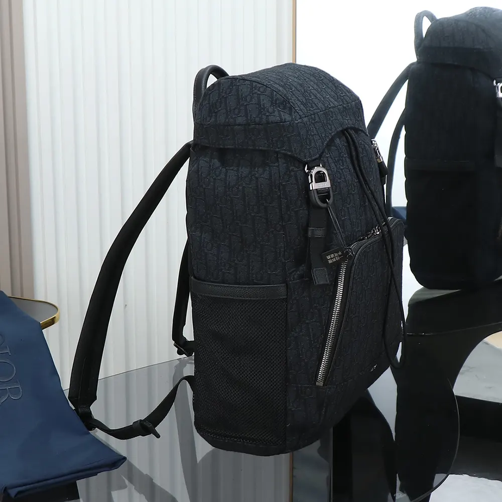 Side angle showing compact silhouette of Dior Men Dior 8 Backpack with Flap