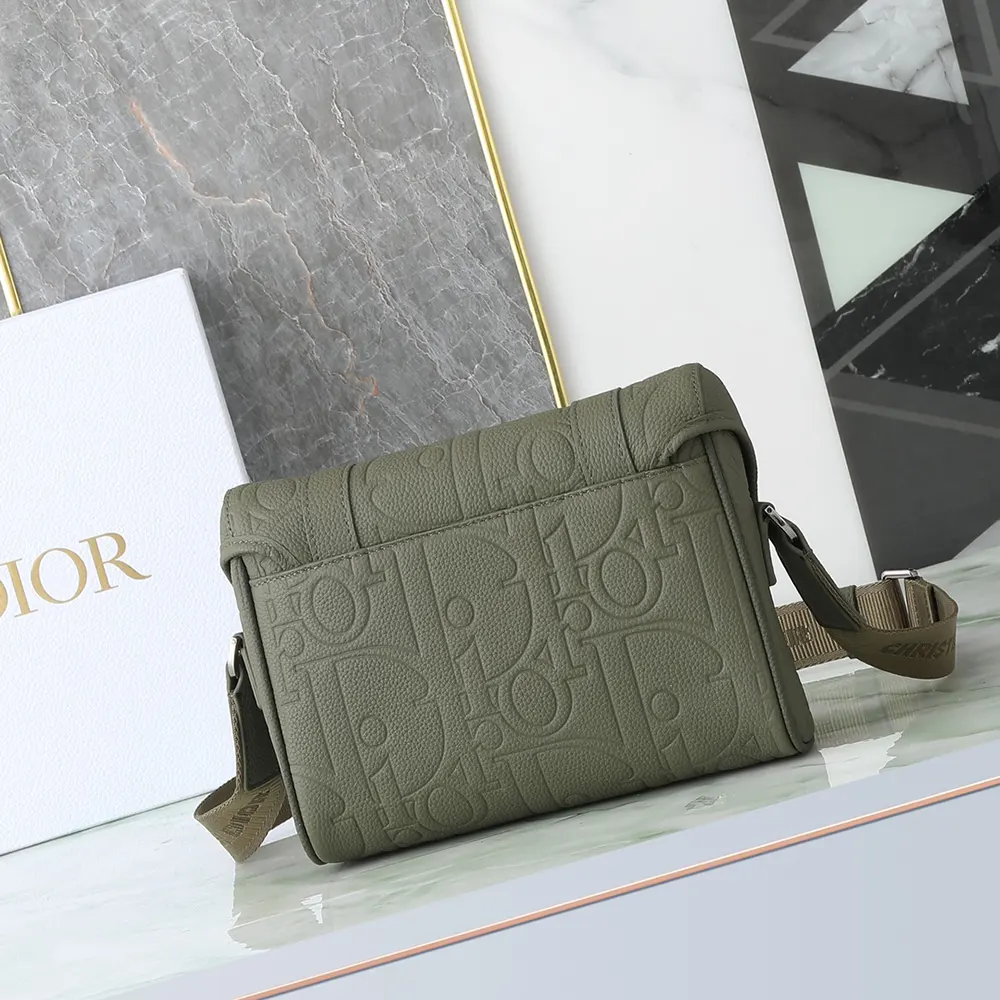 Side angle showing adjustable strap on Dior Men Hit the Road Messenger Bag with Flap