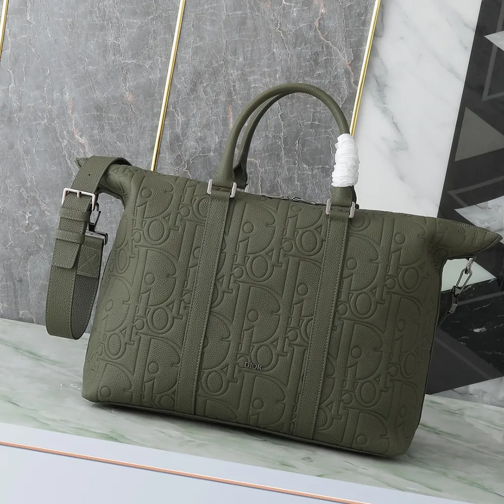 Close-up on Dior Gravity leather detail and silver closure