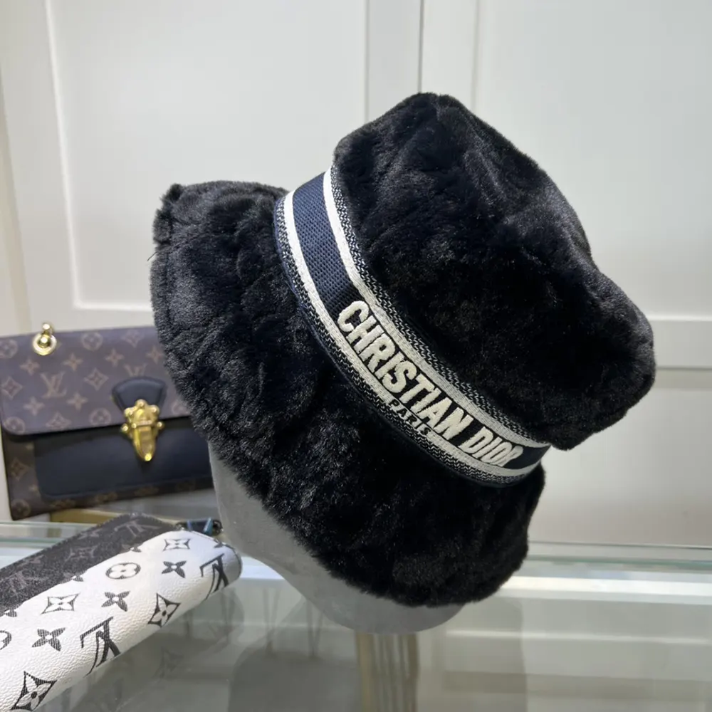 Side angle showing small brim of Dior Unisex D-Bobby Cannage bucket hat