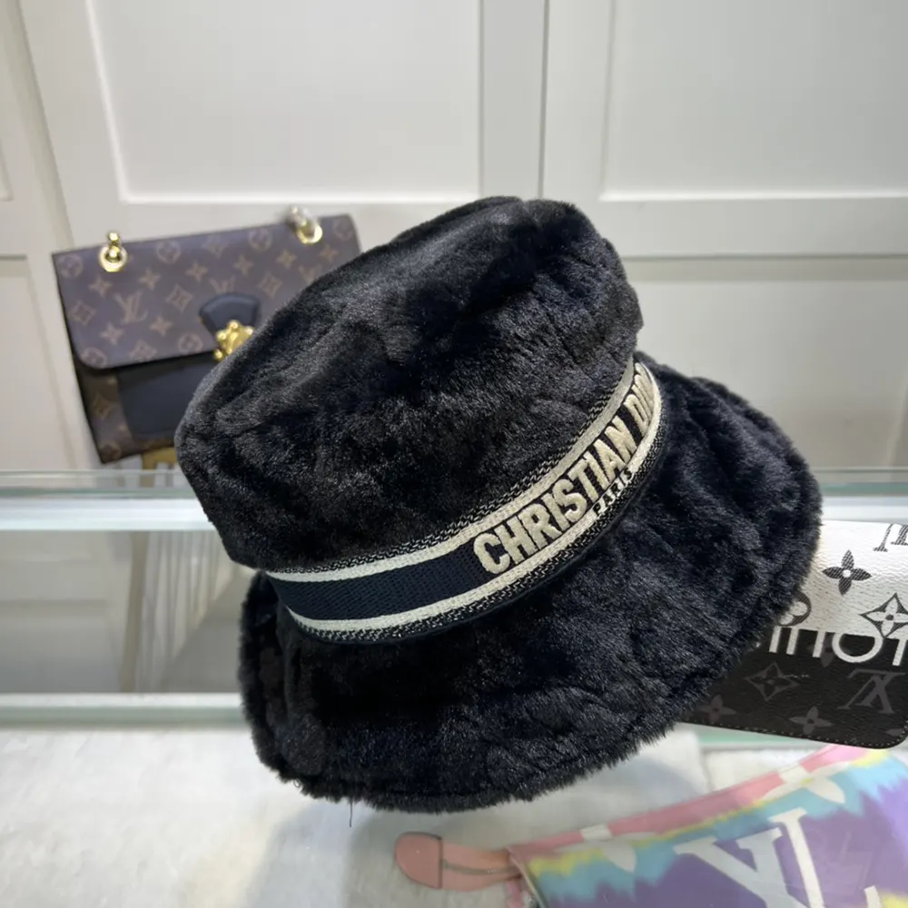 Close-up of Dior Cannage quilting on black shearling bucket hat
