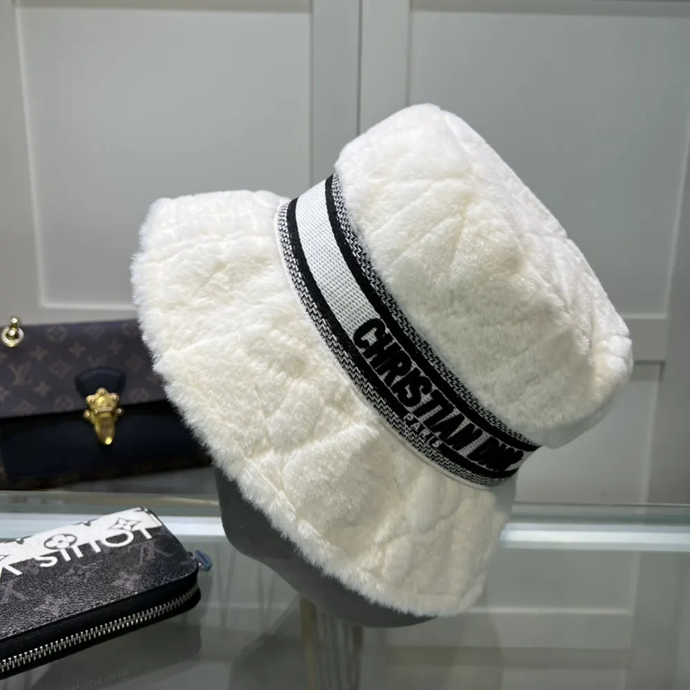 Side angle showing small brim and texture of Dior D-Bobby Cannage hat