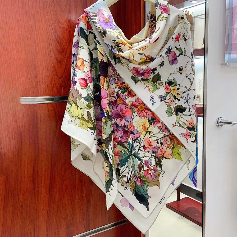 Dior 4 Saisons Été Soleil scarf styled as neck accessory in green multicolor