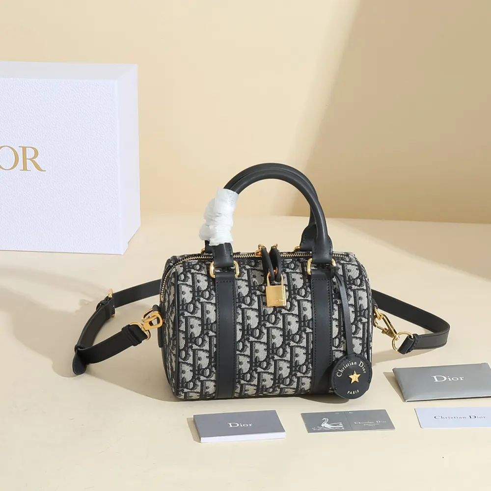 Close-up of blue jacquard fabric and silver hardware on Dior Groove 20 Bag