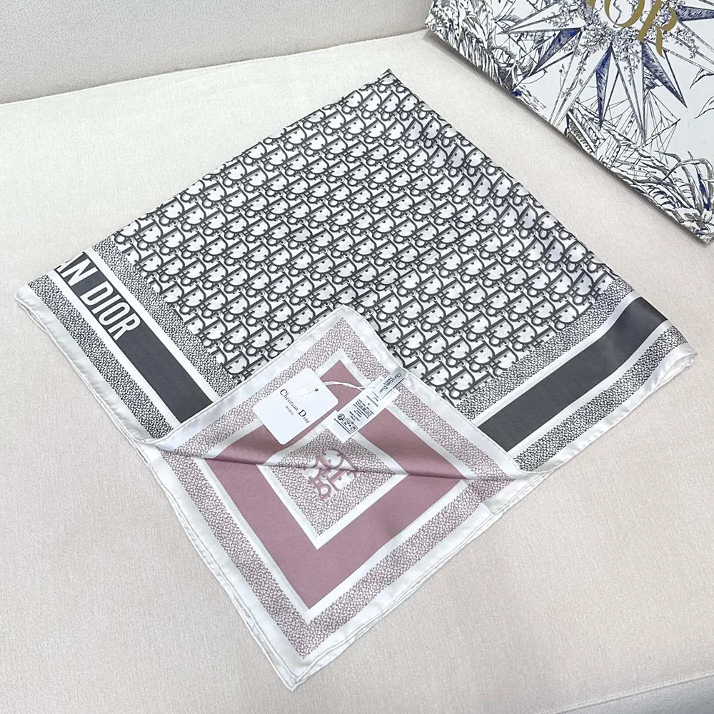 Dior Unisex Oblique Diortwin scarf elegantly folded showing rose des vents detail