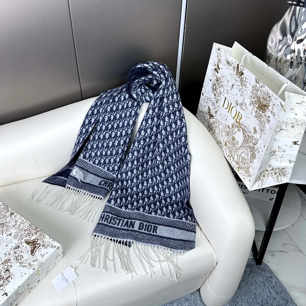 Detail of soft cashmere texture on Dior Unisex Oblique Scarf navy blue
