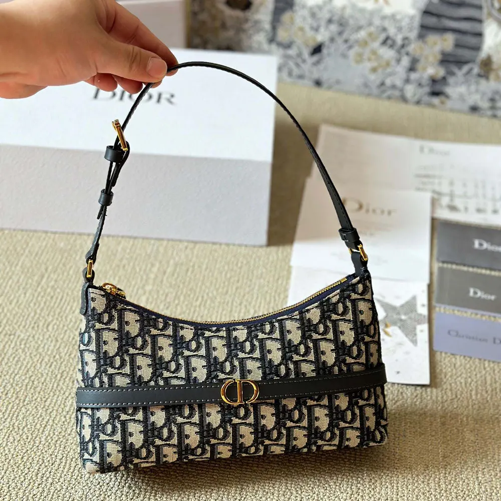 Side angle showing the structured silhouette of Dior Women 30 Montaigne Cigale Mini Bag